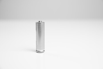 18650 Li-ion silver battery salt and alkaline GP R6 on a white background. disposable and rechargeable accumulator.
