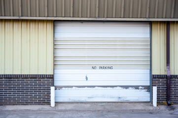 No parking written on rollup overhead service entrance door