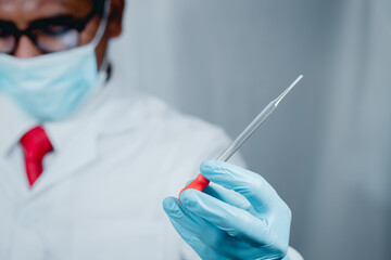Doctor or scientist wearing antivirus clothing In the laboratory, research laboratories are...