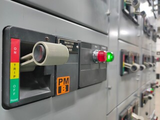Select focus circuit breaker in Electric room on industrial,   	Rocker switch for start or stop motor.