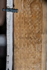 Side view of a drywall mount anchor and screw 