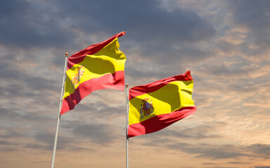 Flags of Spain and Estonia.