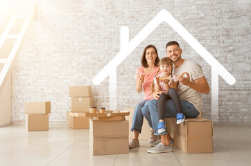 Happy family with cardboard boxes in their new house
