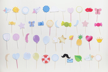 Different cupcake toppers on white background