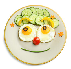 Creative breakfast for children with eggs and fresh vegetables on white background