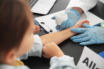 Little girl undergoing allergen skin test in clinic