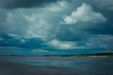 landscape with a river and a stormy sky, selective focus