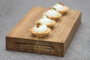 Food snacks and appetizers with cheese, meat  on table. Catering banquet table. Catering party. Corporate event or wedding celebration.