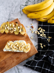 bruschetta or sandwich with banana and nuts