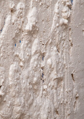 Wall covered with plaster as an abstract background.