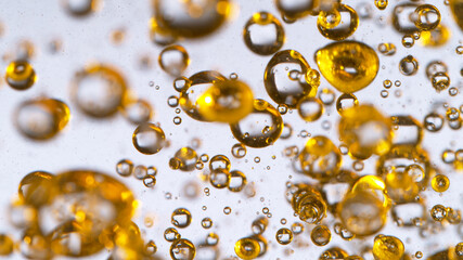 Oil bubbles isolated over white, macro shot.