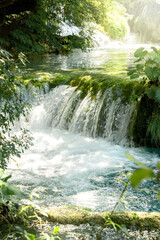 Morning view of waterfall cascade in the forest