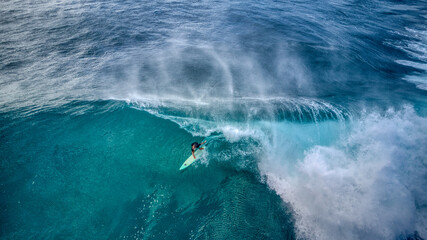 Cool Overhead View of a Surfer Riding a Breaking Wave at Sunset Beach, Hawaii