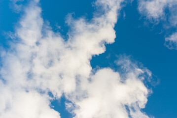 Obraz premium White clouds in blue sky.Winter clouds blue heaven background.