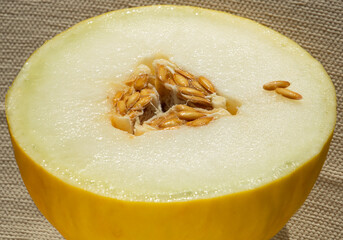 Half of honedrew melon cut sharply in the middle