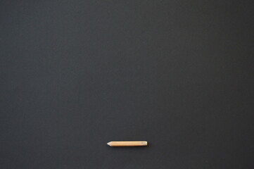 simple pencil on black background