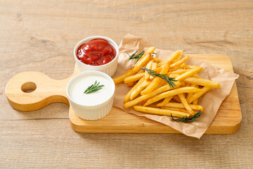 French fries with sour cream and ketchup