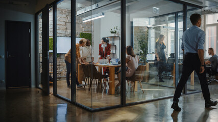 In the Stylish Modern Office Meeting Room: Diverse Group of Business Growth Marketing Professionals...