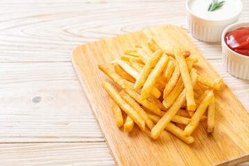 French fries with sour cream and ketchup