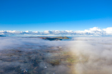 Above the clouds at Portnoo in County Donegal with fog - Ireland