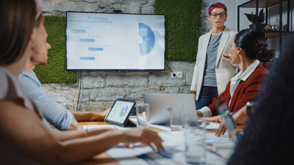 Office Conference Room Meeting: Pink Haired Company CTO Strategist Doing TV Presentation to a...