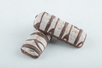 Delicious chocolate bars on a white background