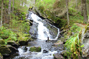 waterfall flowing down the stones in karelia