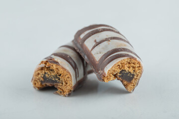 Delicious chocolate bar on a white background