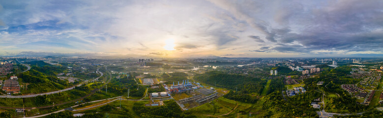 Aerial Panorama view of a Gas Turbine Power Plant Station during sunrise. Gas Turbine converts...