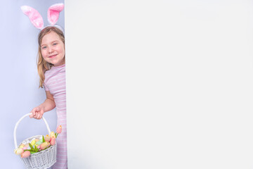 Easter greeting card with happy cute girl