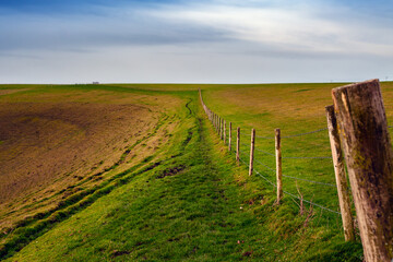 Obraz premium Circular walk at Mere Downs on a stormy day, Wiltshire, Uk