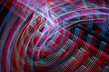 Light painting abstract background. Red and white light painting photography, long exposure,...