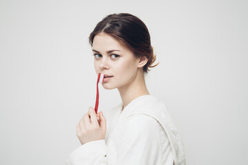 cheerful woman in robe toothbrush morning dental care