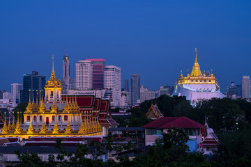 Wat Saket (Temple of the Golden Mount) and Wat Ratchanatdaram (Loha Prasat Metal Castle) which are famous landmark of Bangkok, Thailand.
