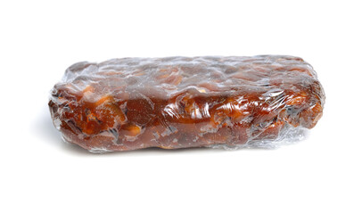 Briquette of ripe Peeled tamarind isolated on white baclground