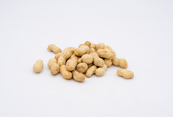 A pile of peanuts on a white background