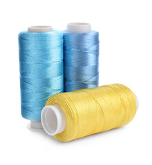 Set of colorful sewing threads on white background