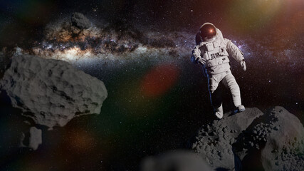 Fototapeta na wymiar astronaut during spacewalk in the asteroid belt