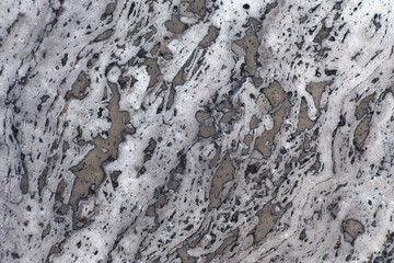 Grey texture of marble tile; color photo.
