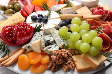 Assorted appetizers served on table, closeup view