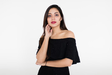 Young and beautiful healthy Asian woman pose to camera with fun and happiness for her face that makeup and paint as a dark and evil witch for Halloween festival. Concept for relax event