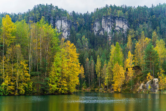 lake with reflection on autumn forest in the Czech Republic