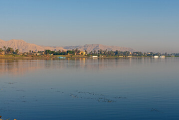 Naklejka na ściany i meble View of river nile in Egypt showing Luxor west bank