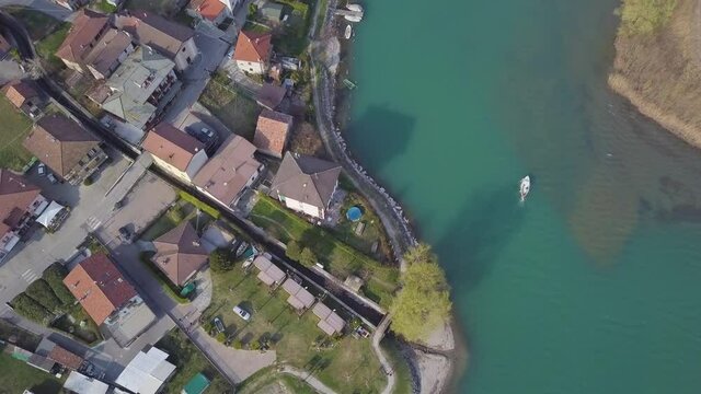 city ​​river with a boat from a bird's eye view