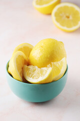 A bowl with yellow bright lemons