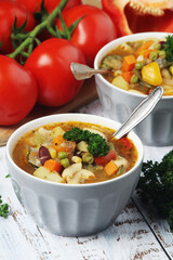Bowls with Italian soup minestrone	