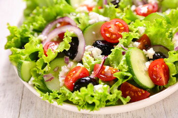 vegetable salad with tomato, cucumber and olive