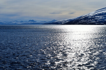 Sunny day with mighty mountains and ocean in Hella, Norway