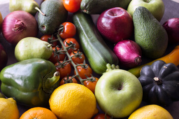 Fresh organic fruits and vegetables on a table. Healthy eating concept. Vegetarian meal ingredients top view photo. 