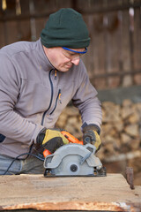 Carpenter using circular saw